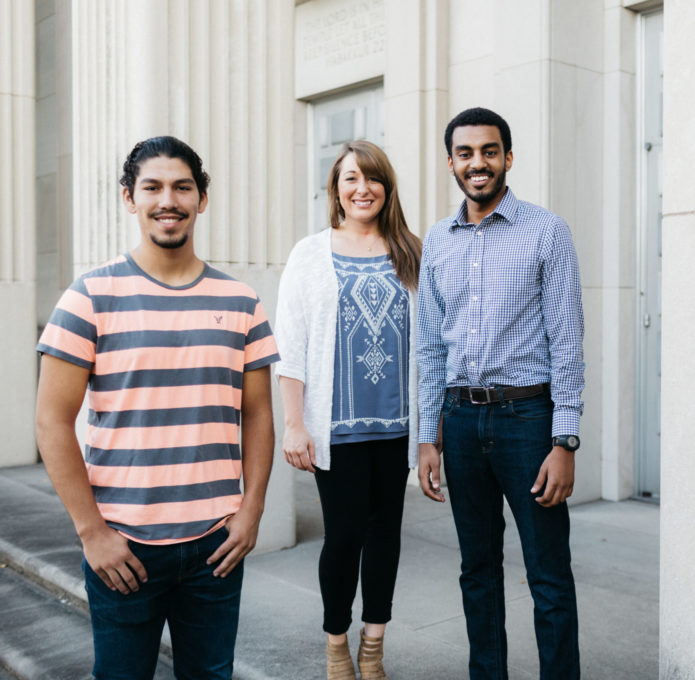 318A4140 Students standing at the exterior entrance to Ruth Chapel